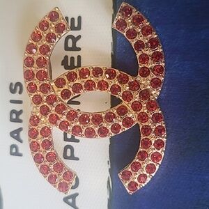 Goldtone and Red Crystal Brooch